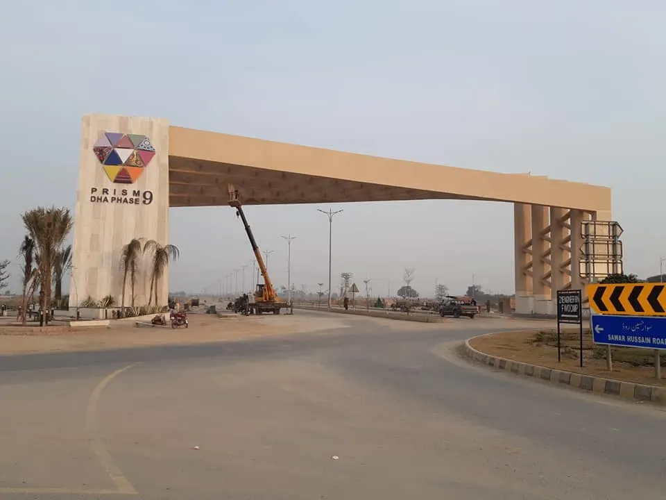 DHA Phase 9 Prism Lahore entrance gate on the main road